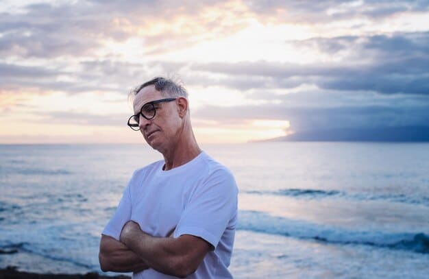 A successful retired athlete thoughtfully gazing at a serene landscape, symbolizing financial freedom and peace of mind.