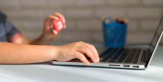 Close-up of hands typing on a laptop keyboard, filling out an online registration form, with a soccer ball subtly visible in the background, conveying preparation.