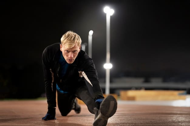 A track and field athlete, grimacing slightly but pushing through, showing determination and resilience during a tough training run in a stadium, symbolizing overcoming physical and mental fatigue.