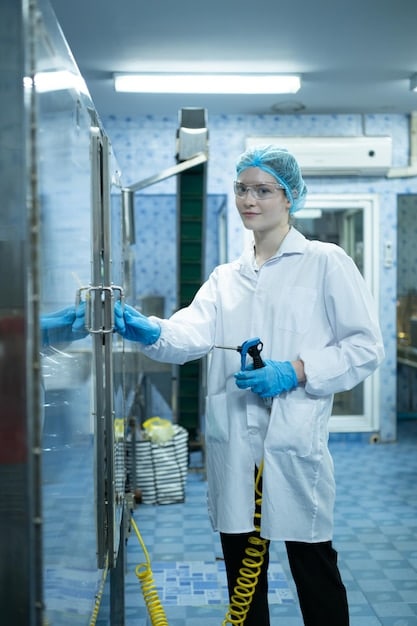 A researcher in a cleanroom environment carefully working with a dilution refrigerator setup, emphasizing the extreme precision and conditions required for quantum computing hardware.